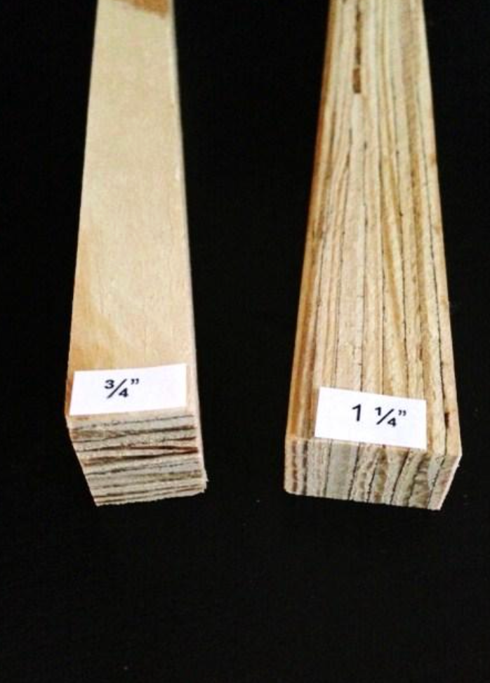 Two pieces of wood with labels on them one of which says 1/4