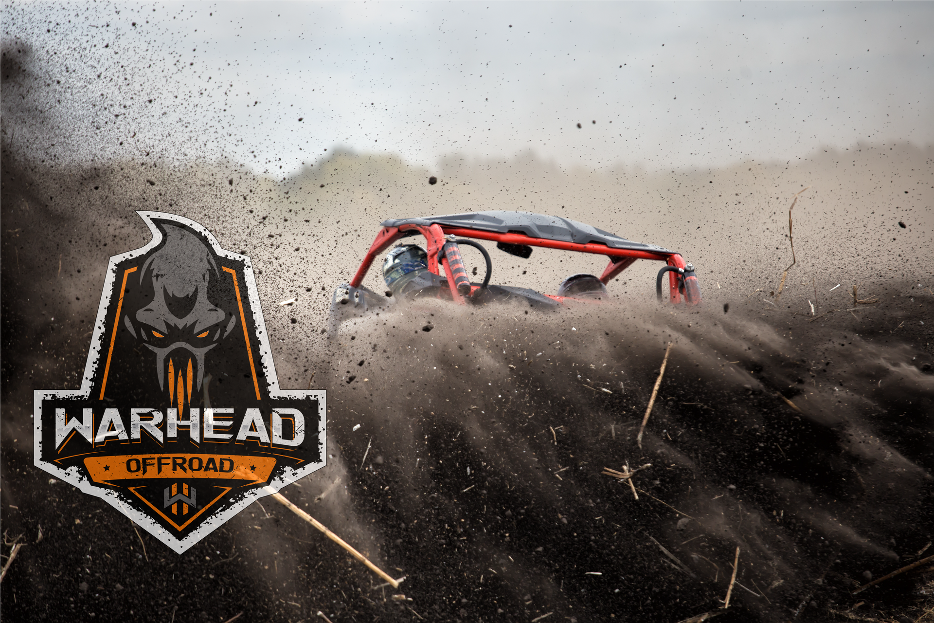 A logo for warhead off road with a vehicle in the background