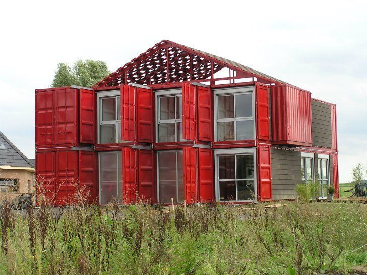 A House Made out Of Shipping Containers Is Being Built in A Field — Leader Removals & Storage in Canberra, ACT