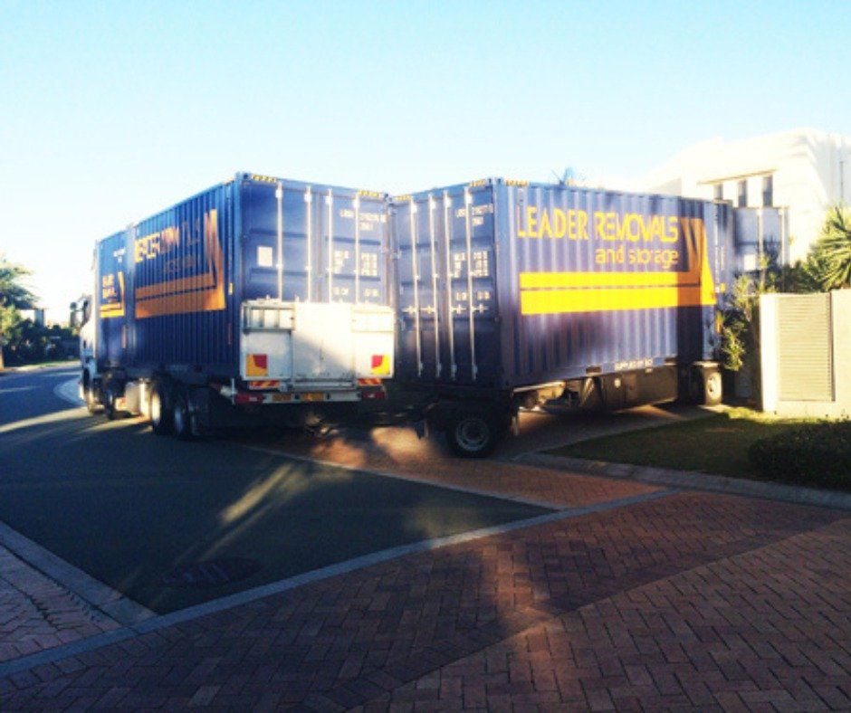 A Blue Truck with The Word Leader on It — Leader Removals & Storage in Canberra, ACT