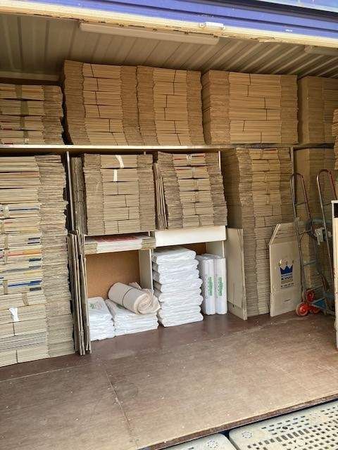 A Warehouse Filled With Lots of Cardboard Boxes — Leader Removals & Storage in Canberra, ACT
