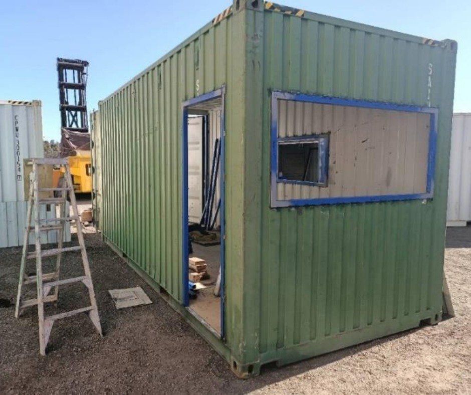 A Green Shipping Container with A Ladder in Front of It — Leader Removals & Storage in Wodonga,VIC