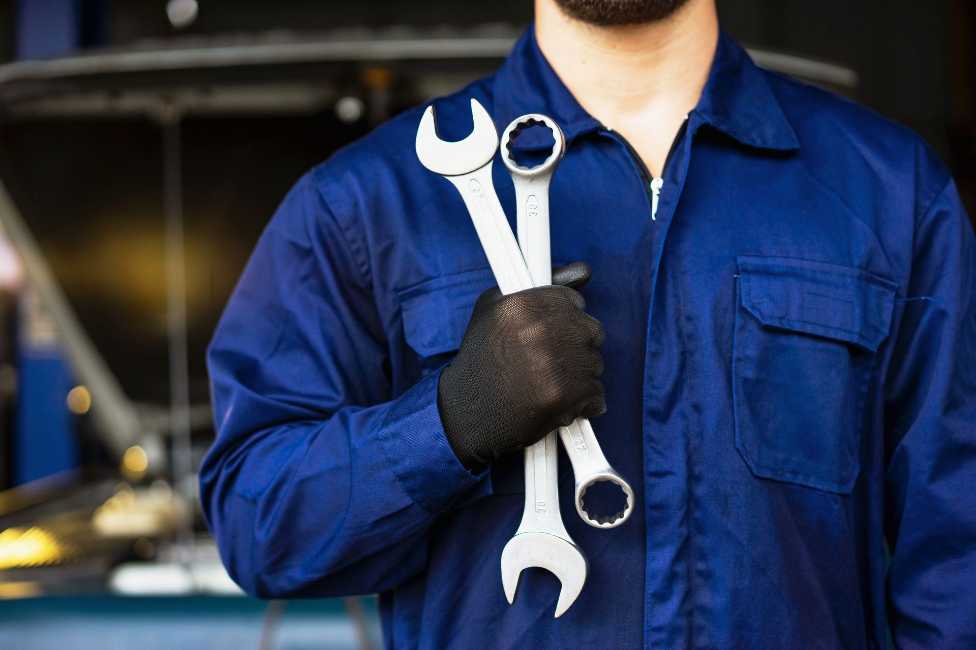 A person holding a wrench | Hornsby, NSW | Advance Tyre and Auto