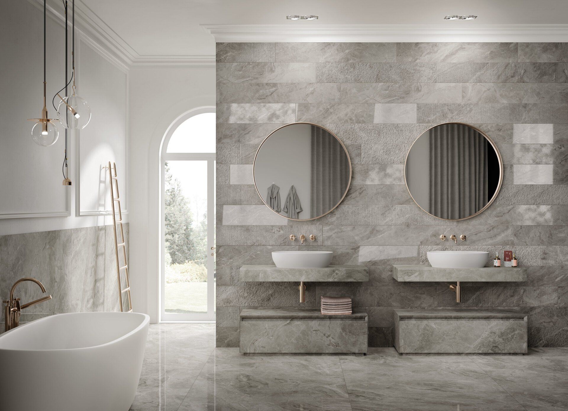 Un bagno con due lavandini, due specchi e una vasca da bagno.