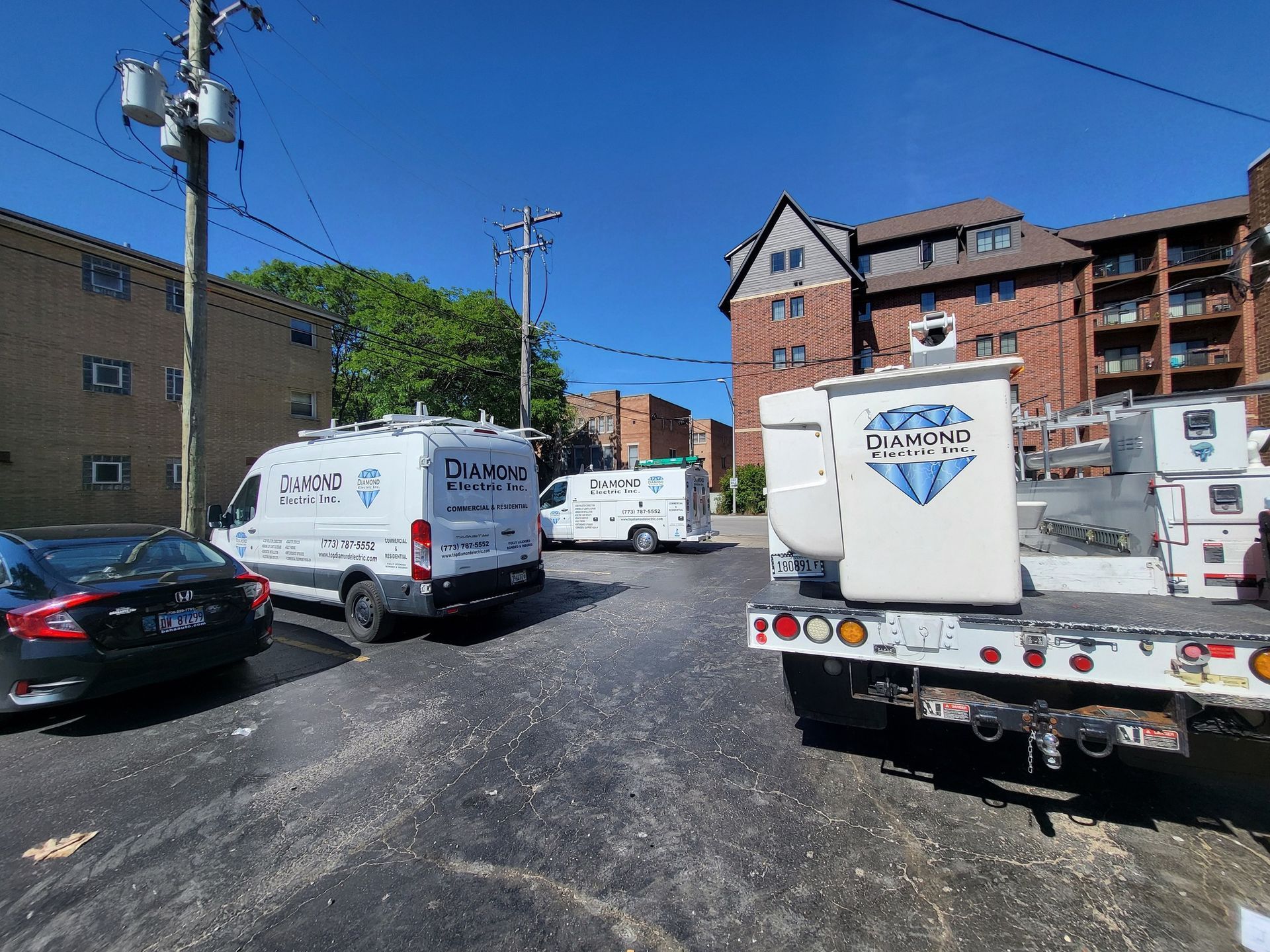 A lot of trucks are parked on the side of the road.