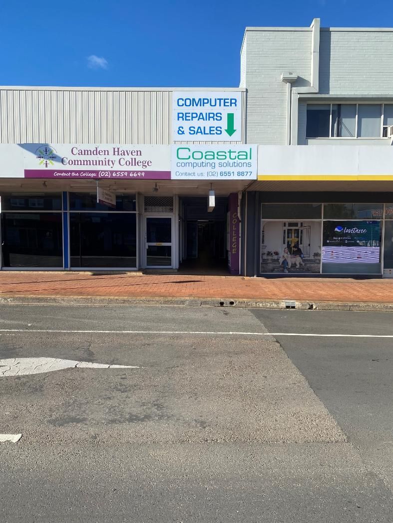 A Building With a Sign That Says Coastal on It — Coastal Computing Solutions in Taree, NSW
