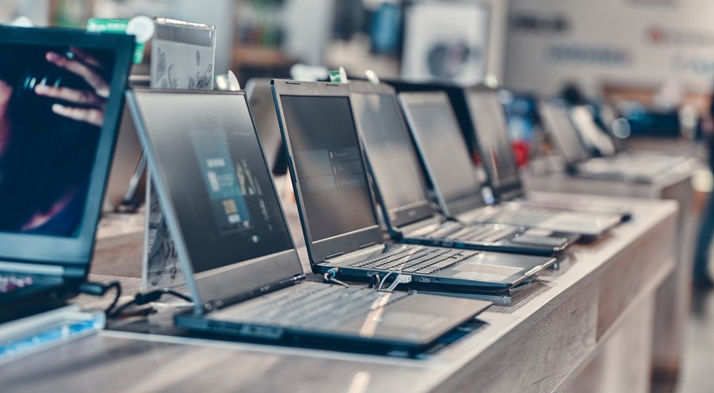 A Row of Laptops Sitting on Top of a Table in a Store — Coastal Computing Solutions in Taree, NSW