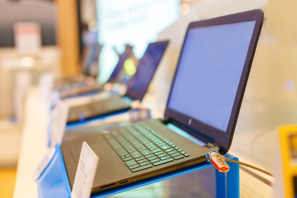 A Row of Laptops Are Sitting on Display in a Store — Coastal Computing Solutions in Taree, NSW