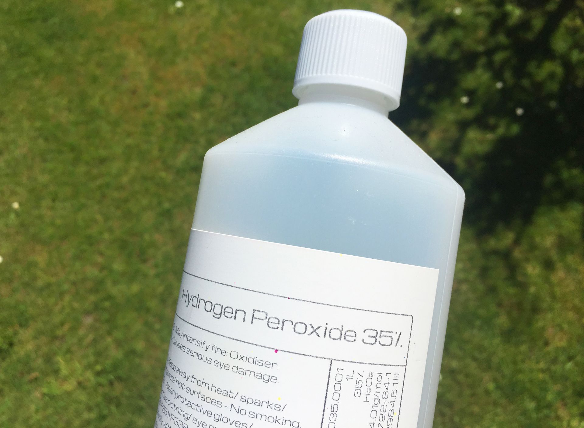 A white plastic bottle labeled 