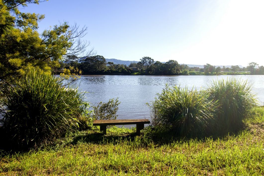 Bench Overlooking a Calm River — Illawarra Underfloor Heating In Nowra, NSW