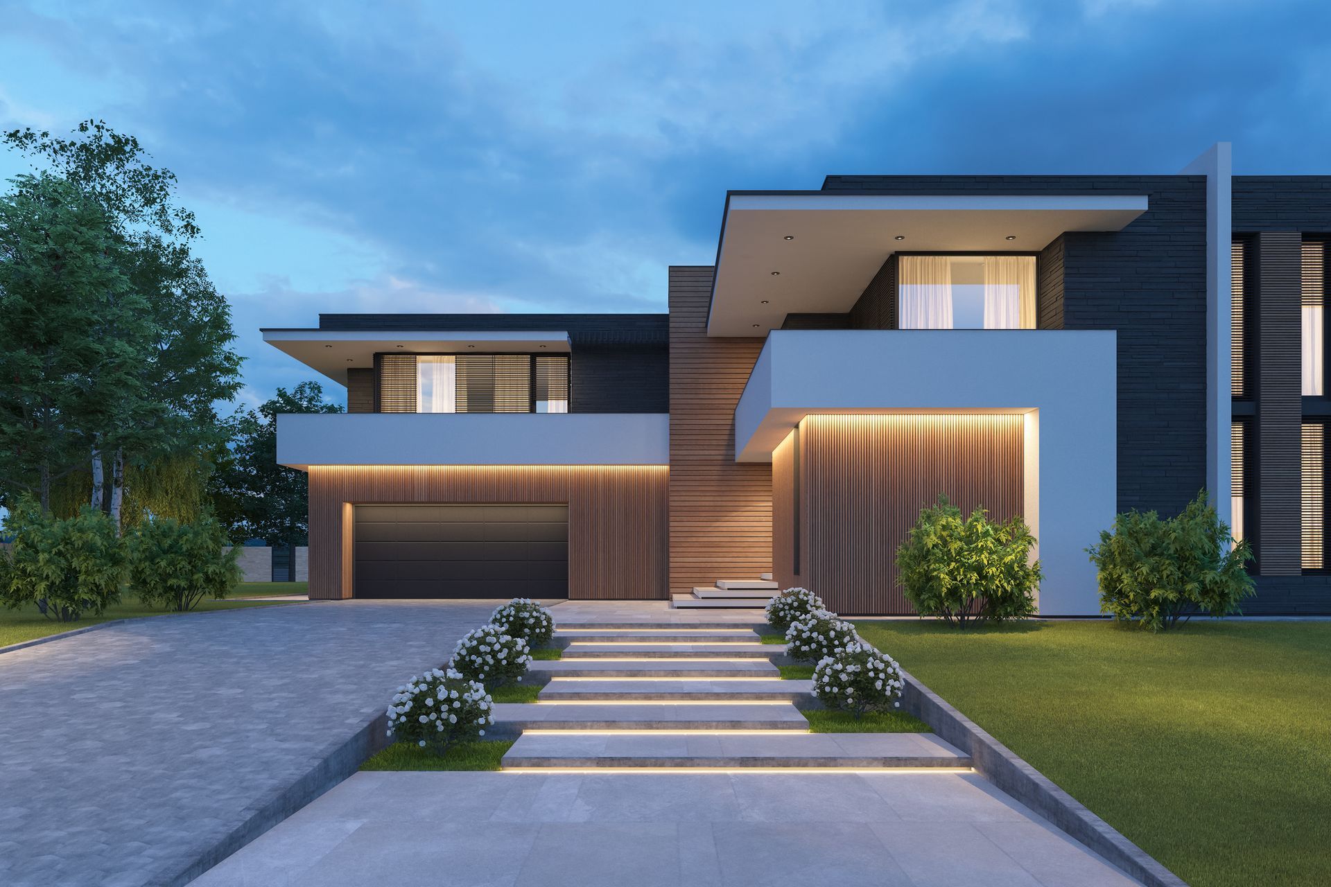 Modern two-story house with sleek design and exterior lighting at dusk.