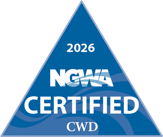Blue triangle badge reading