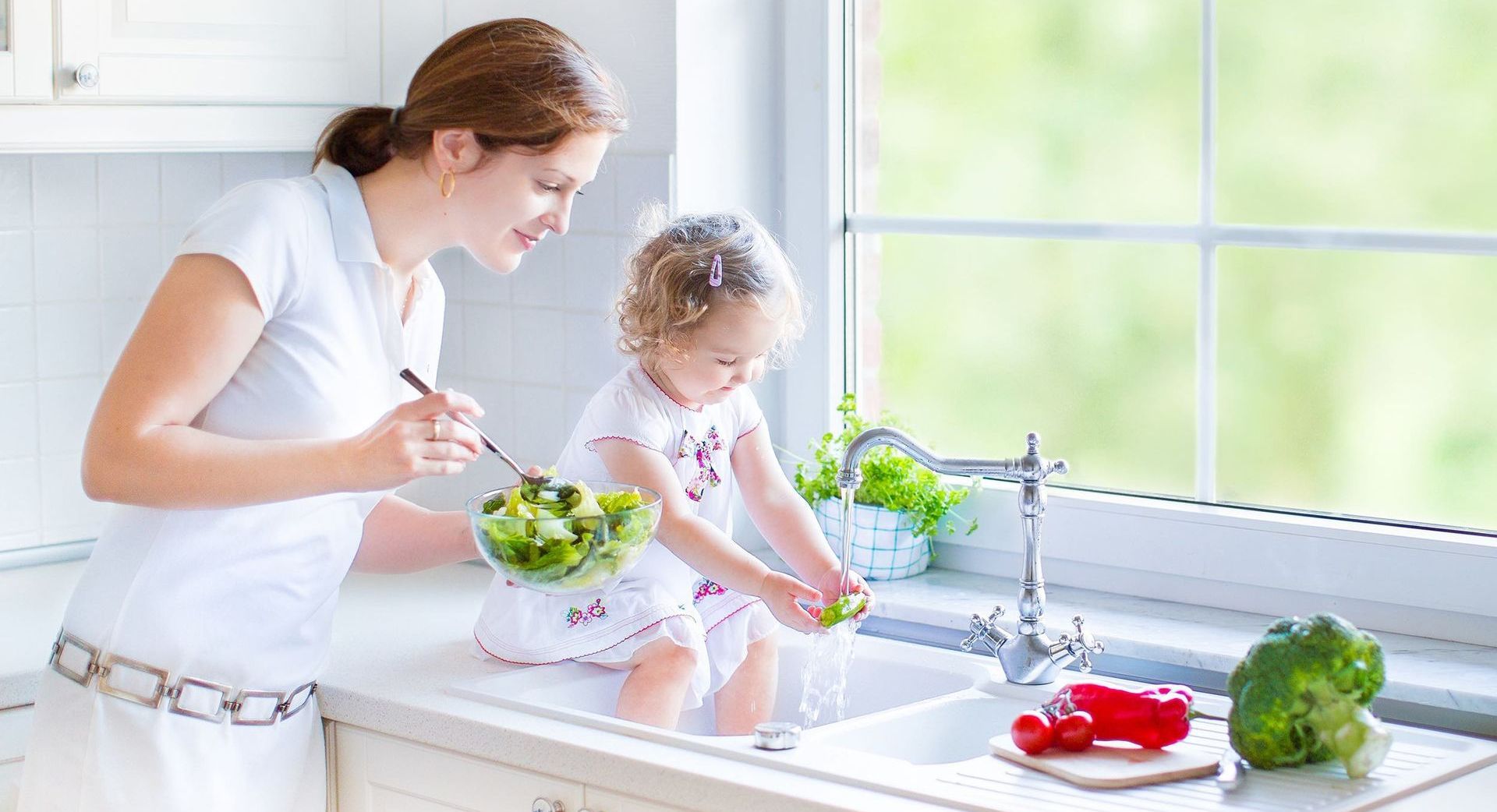 Benefits of house water filtration systems illustrated with clean water flowing from a faucet.
