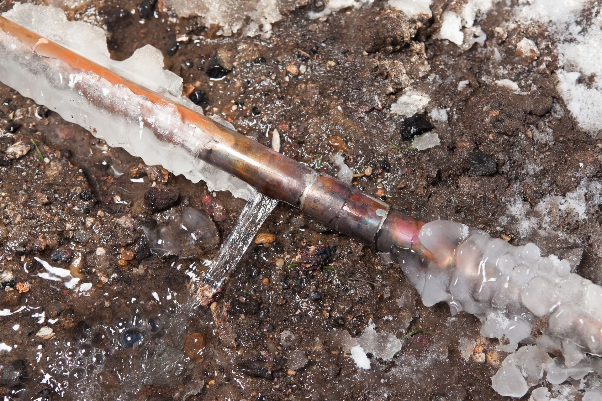 Frozen water line being thawed safely without an open flame
