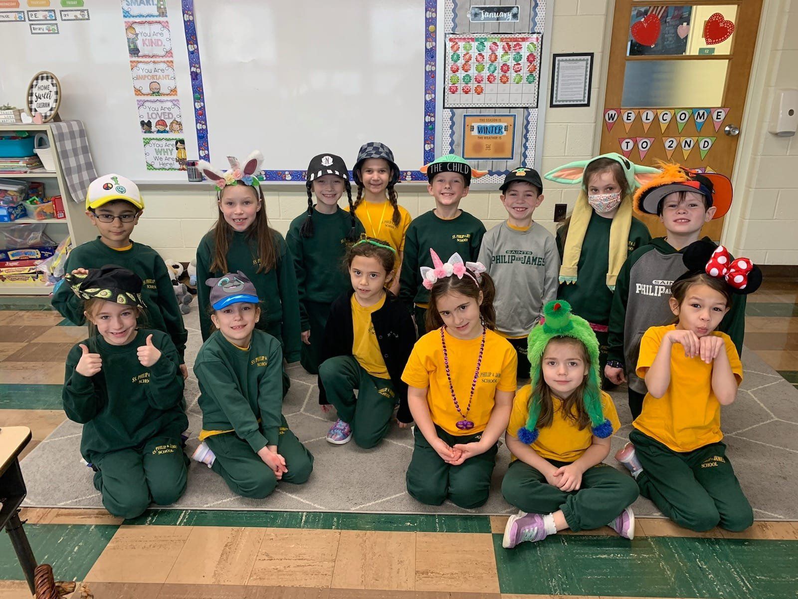 A group of children are posing for a picture in a classroom.