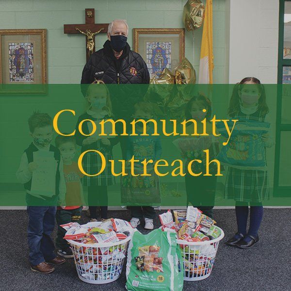 A group of people are standing next to baskets of food.