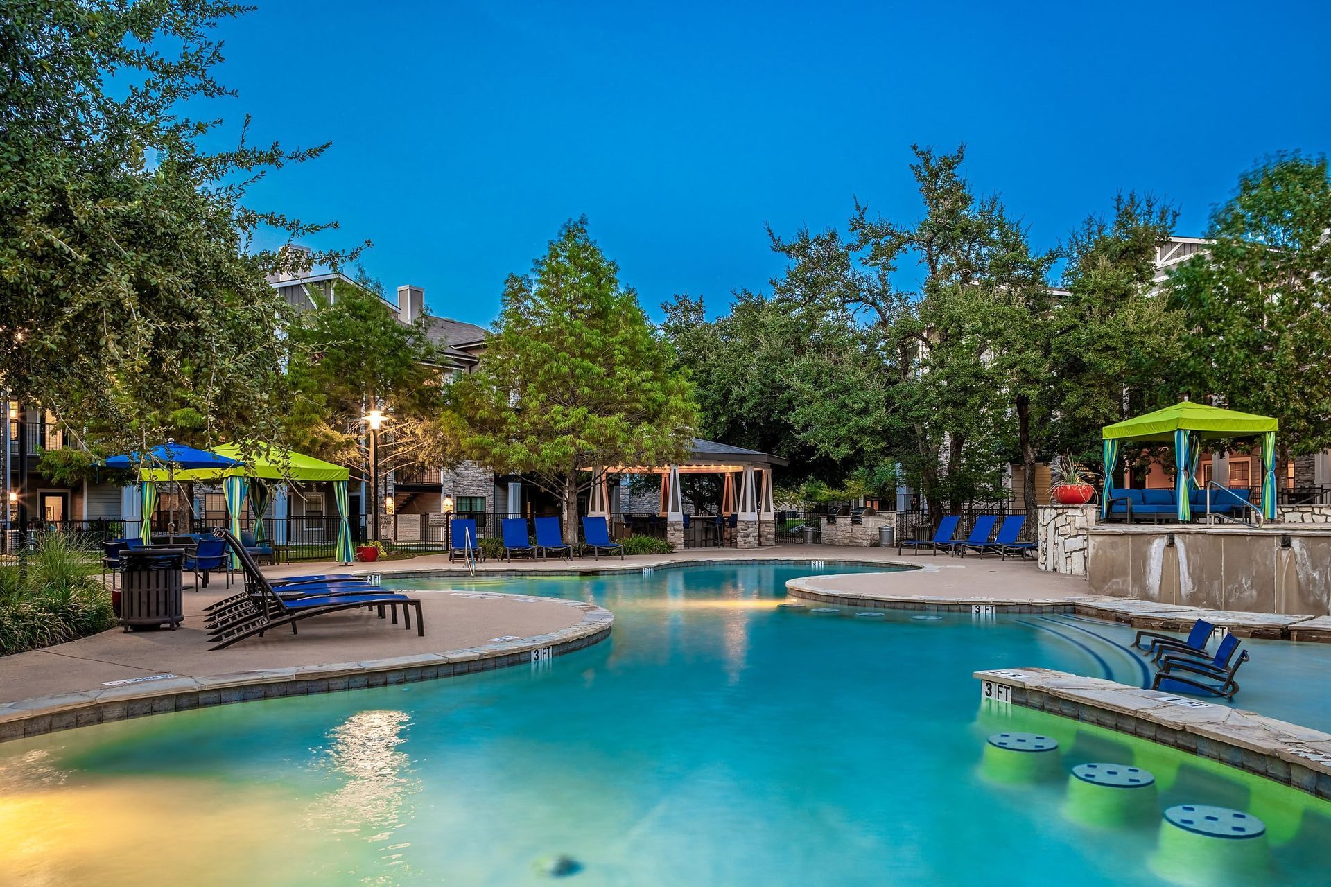 the swimming pool at the preserve at polo ridge apartments tx