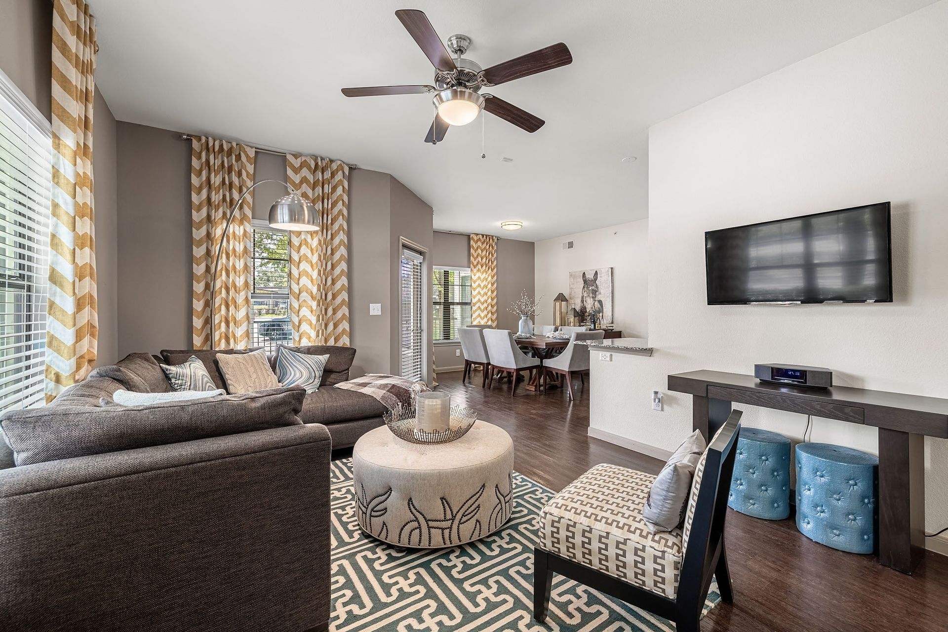 a living room with a couch and a tv