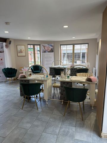 Nail salon treatment area at Claws Nail and Beauty in Daventry with manicure stations and seating