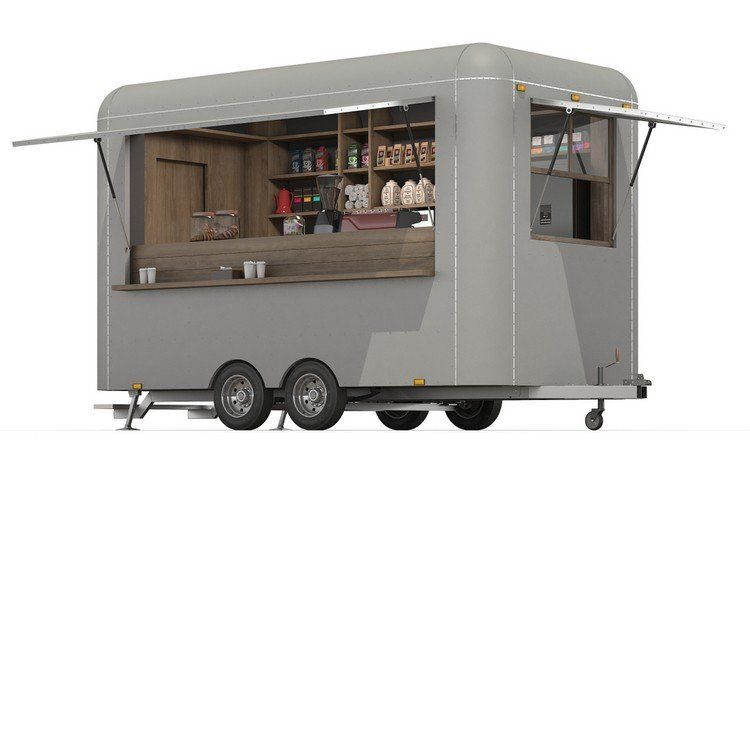 Gray food trailer with open serving windows, displaying interior shelving with supplies.