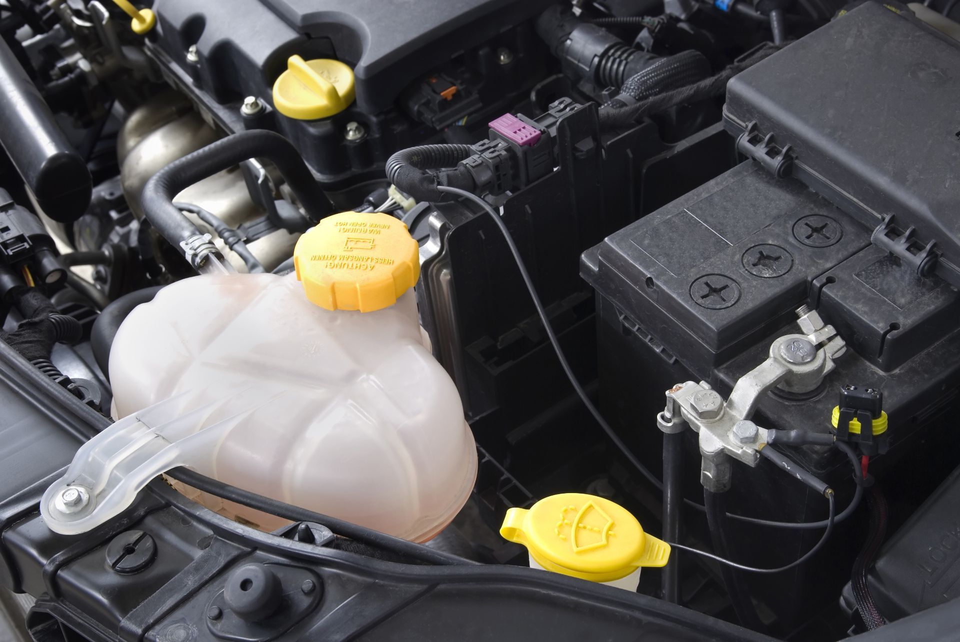 Engine liquid containers