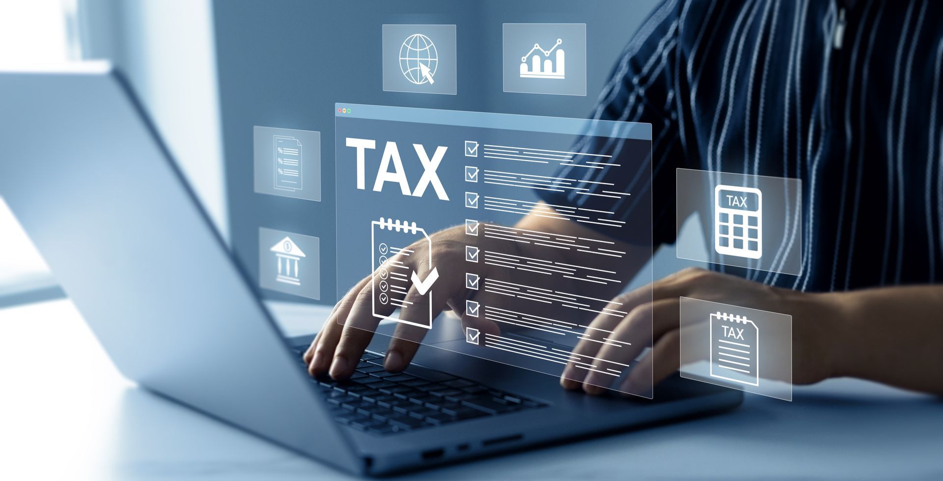 Person typing on laptop with digital tax forms and financial icons overlay. Person typing on laptop with digital tax forms and financial icons overlay.