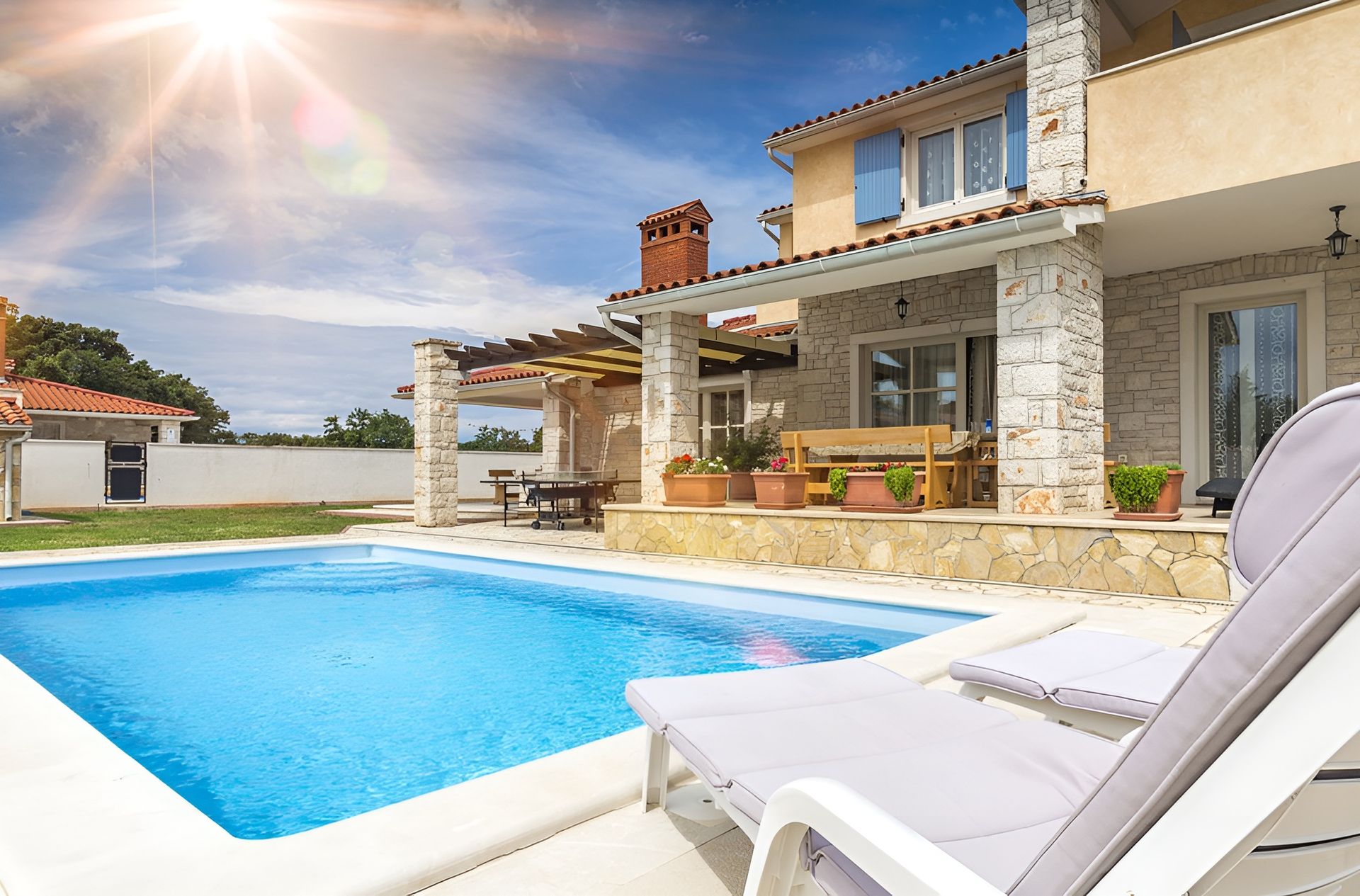 Swimming Pool in Front of a House, Sunny Day, Lounge Chair — Bombs Away in Broadbeach, QLD