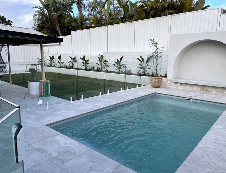 Backyard Patio with A Small Rectangular Pool — Bombs Away Pools in Coolangatta, QLD
