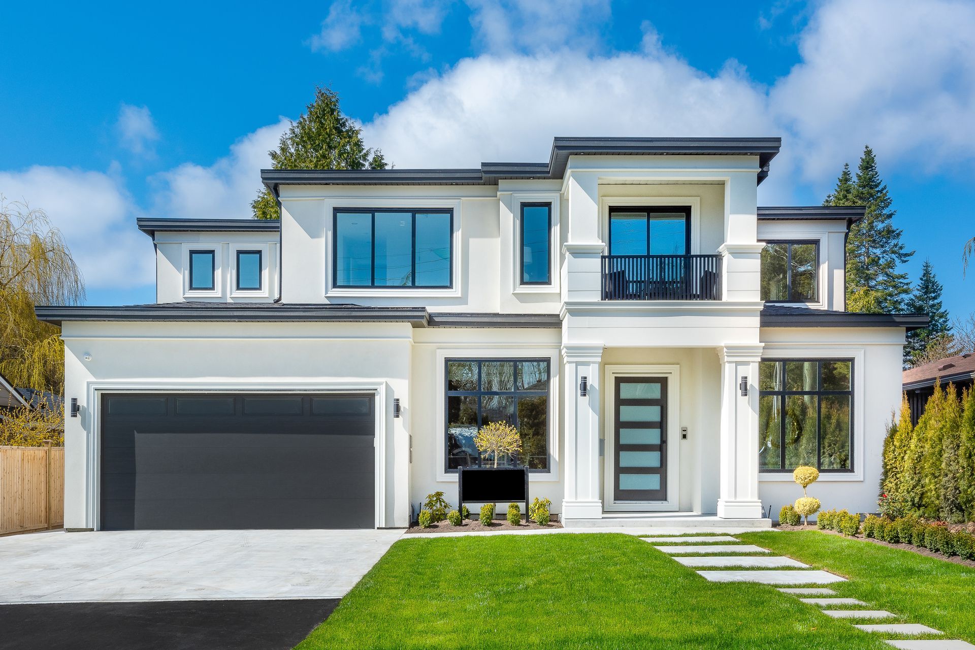 modern home with a flat black roof