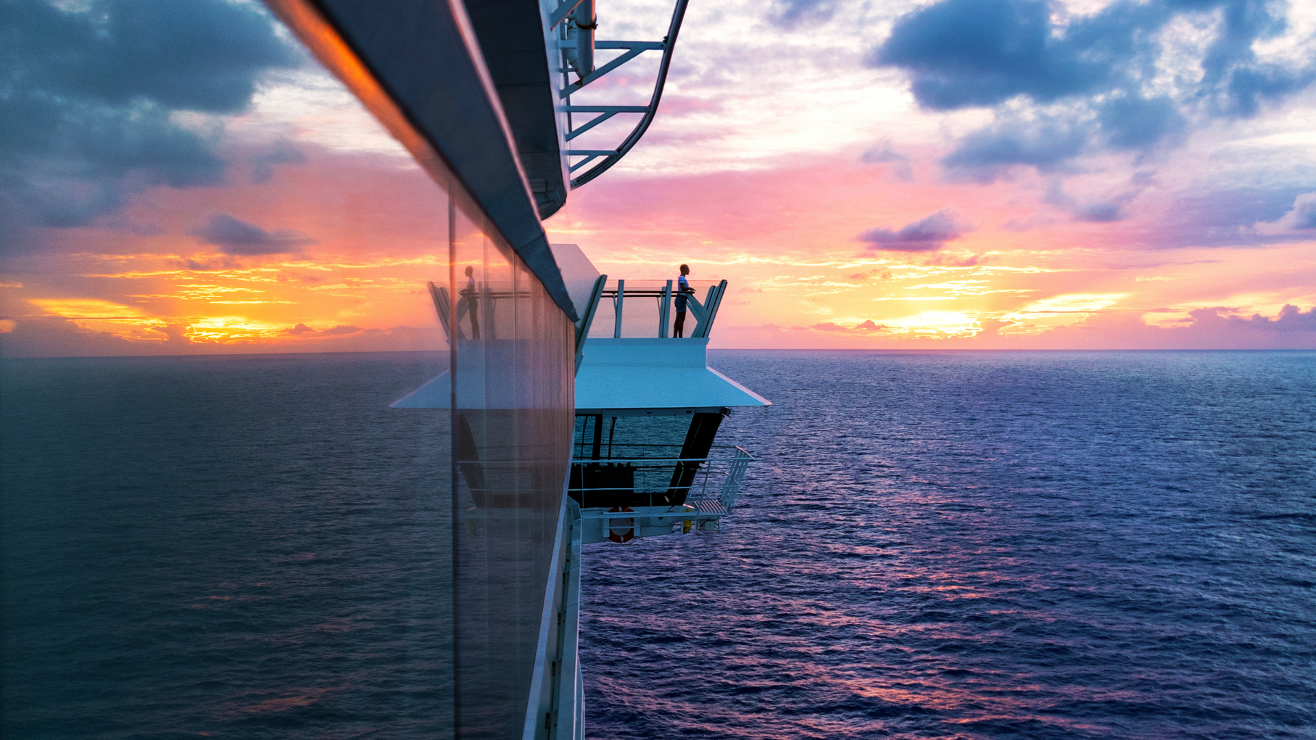 a man is diving into a swimming pool on a cruise ship Barter's Travelnet 