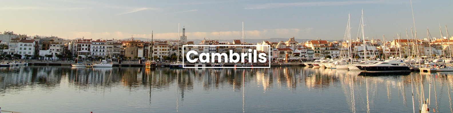 a blurry picture of a harbor with the words cambrils on the bottom Barter's Travelnet