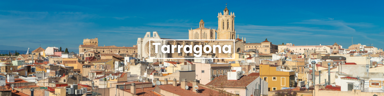 a blurry picture of a city with the word tarragona on it . Barter's Travelnet