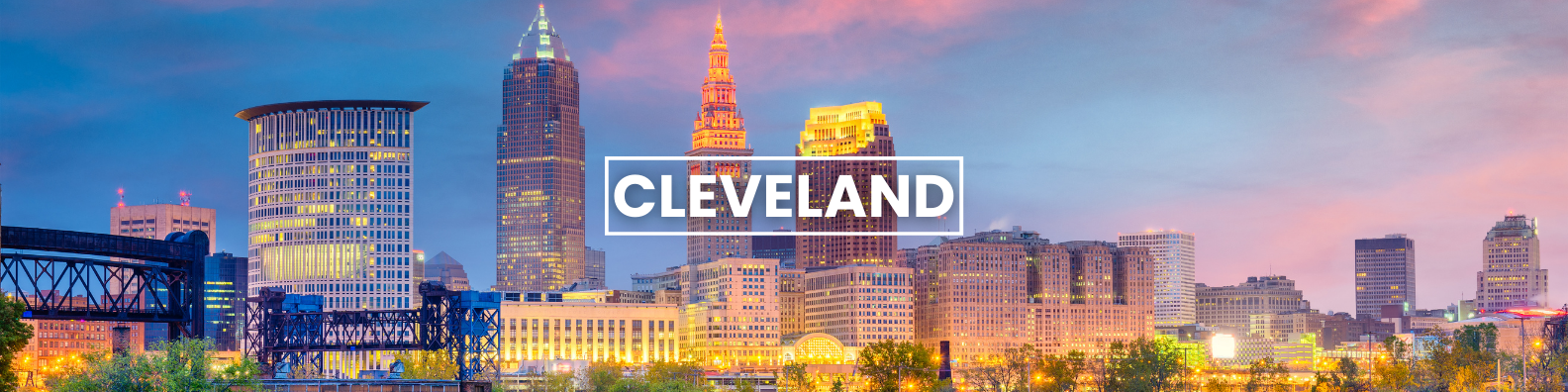 a blurry picture of the city skyline of cleveland .Barter'sTravelnet
