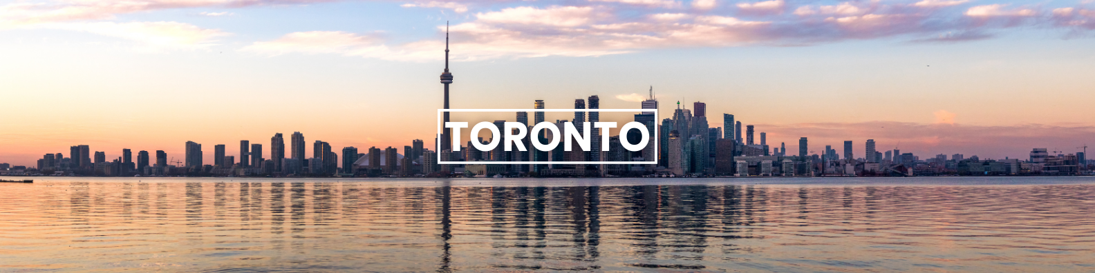the skyline of toronto is reflected in the water . Barter's Travelnet