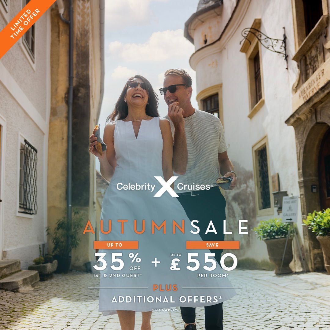 Couple walking in a European street with “Autumn Sale” cruise promotion text overlaid