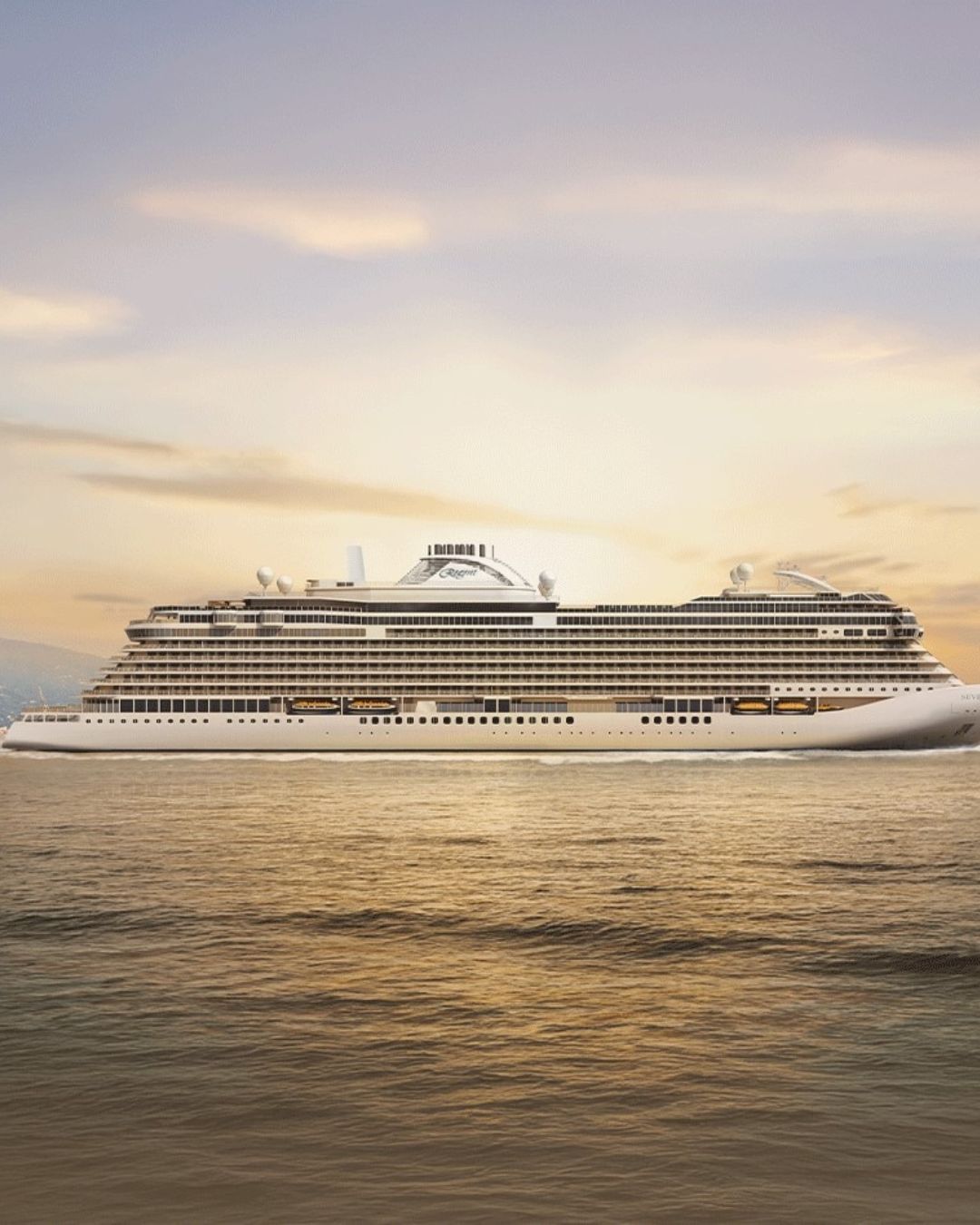 Large white cruise ship Seven Seas Prestige on calm water at sunset with a pastel sky