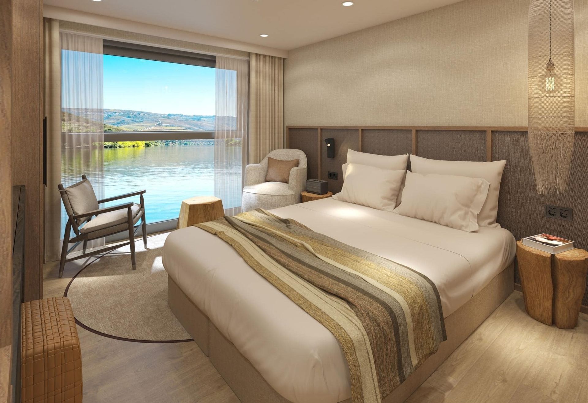 Travelmarvel river cruise ship,stateroom with king bed, lake view, armchair, and floor-to-ceiling window