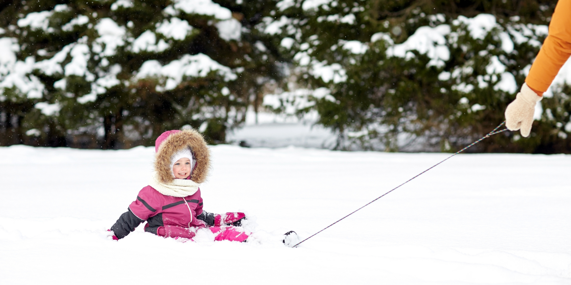 Tips and Tricks for a Magical Lapland Holiday with Kids, Kid Having Fun in the Snow - Blog Post Barters Travelnet