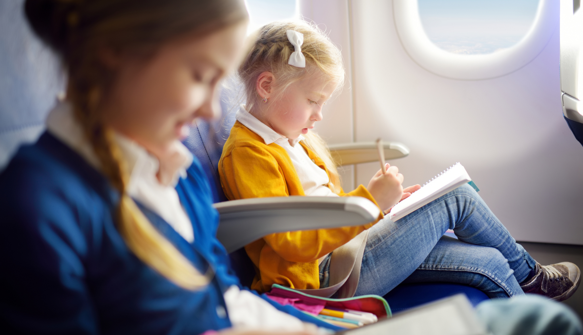 Tips and Tricks for a Magical Lapland Holiday with Kids, Kids Traveling in a Airplane - Blog Post Barters Travelnet