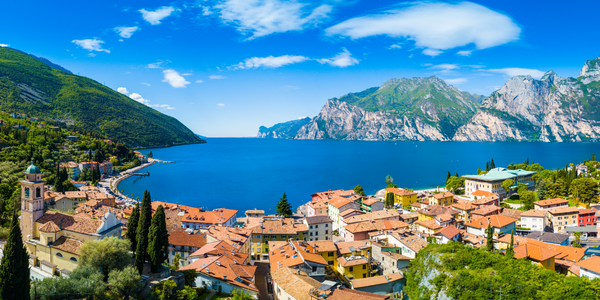 Beautiful Panoramic view of Lake Garda in Italy with a village and mountains in the background, Italian Riviera