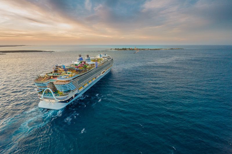 an aerial view of a cruise ship floating on top of a large body of water . Barter's Travelnet 
