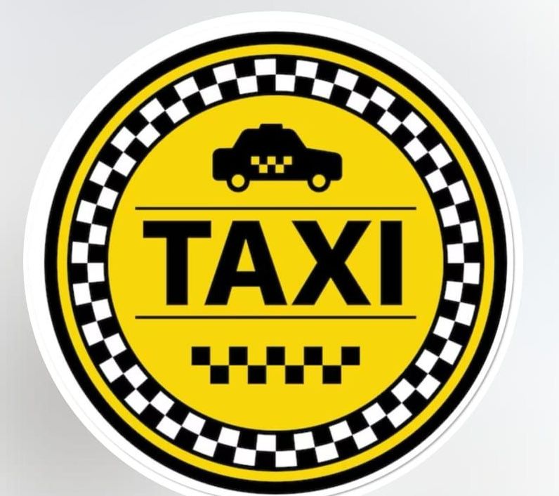 Un cartel de taxi amarillo y negro con un borde a cuadros.