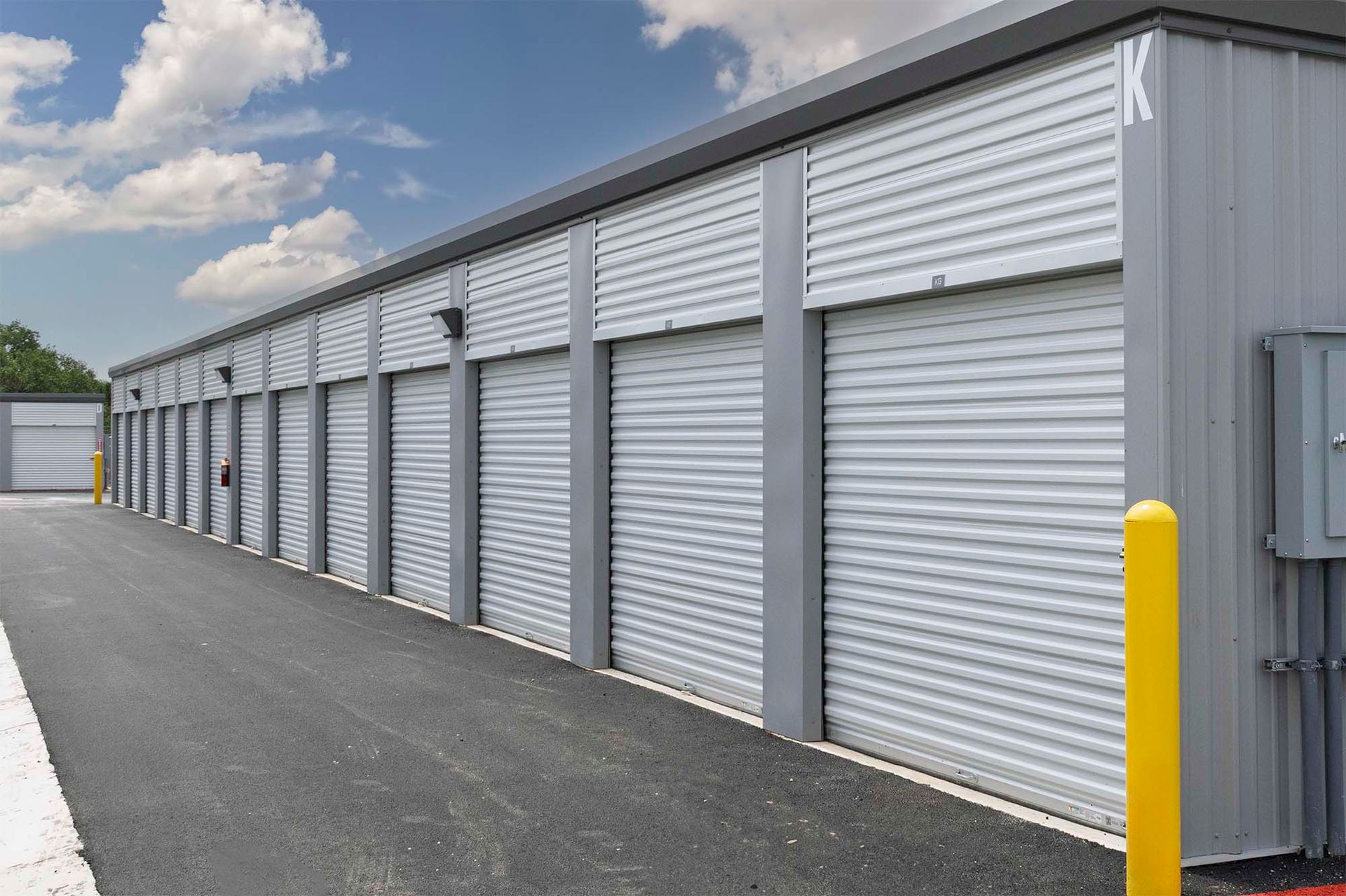 Drive up self storage units with white doors near Canyon Lake and New Braunfels