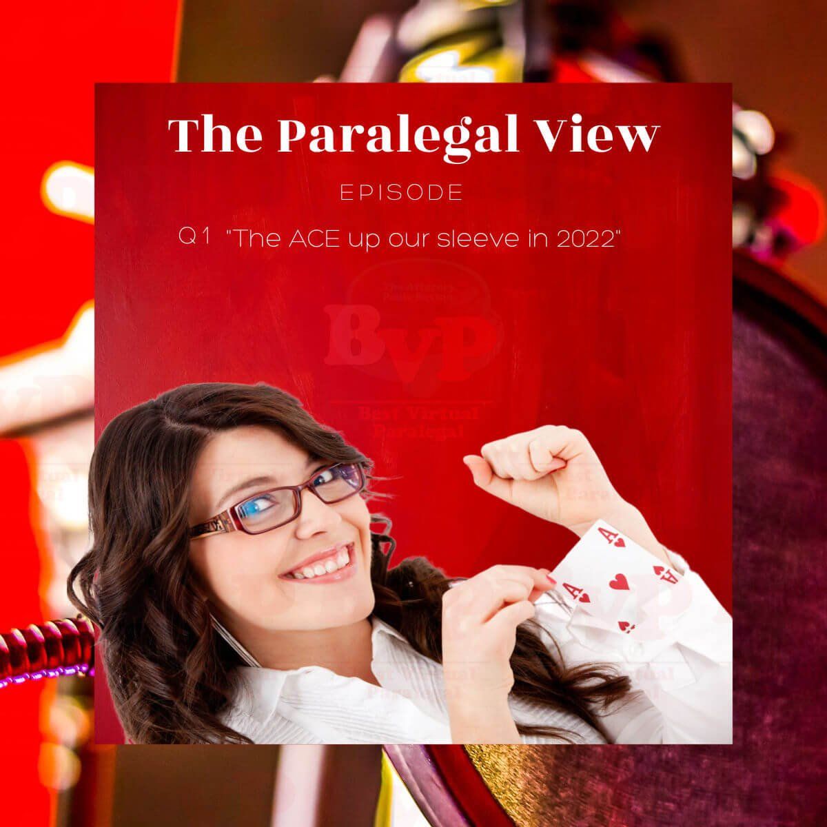 A woman wearing glasses is smiling in front of a sign that says the paralegal view.