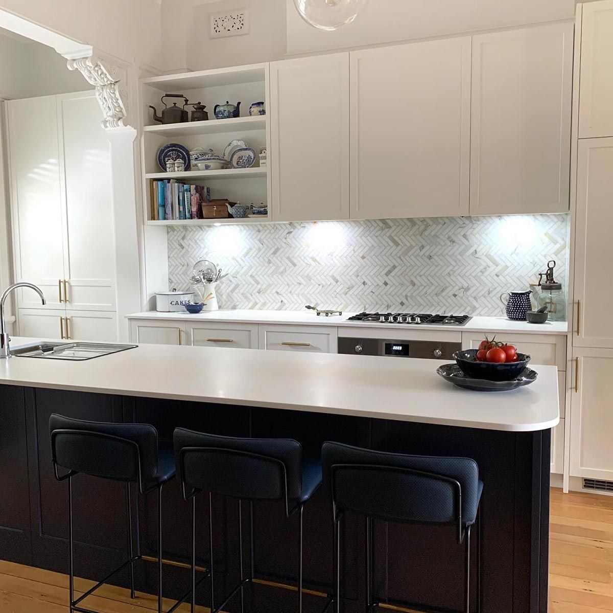 A Kitchen With a Large Island and Stools — Coastal Detail Joinery in Tuncurry, NSW