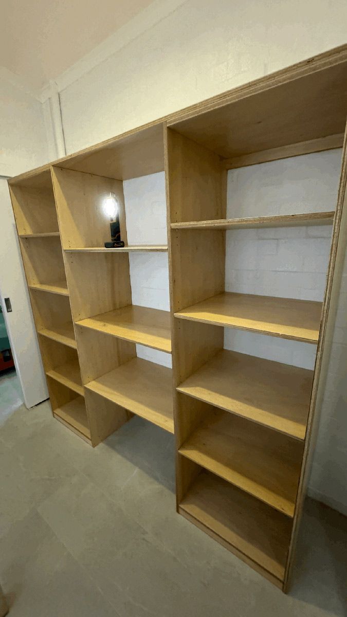 A Row of Wooden Shelves in a Room — Coastal Detail Joinery in Forster, NSW