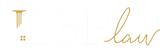 A logo for a law firm with a t and the word law written in gold.