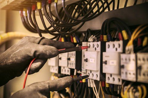 a technician testing a ups system