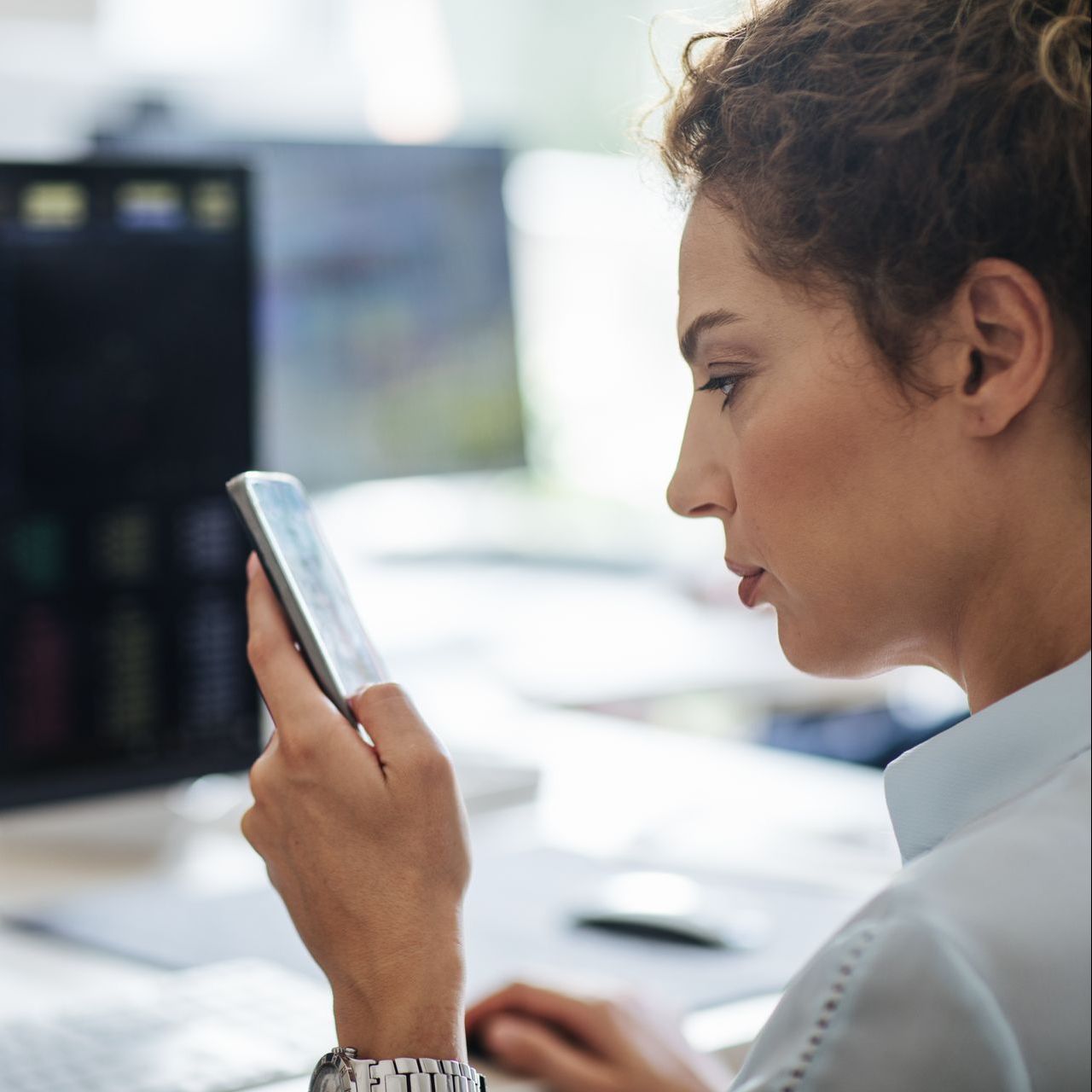 the female broker is researching UPS for Financial Services & Insurance providers