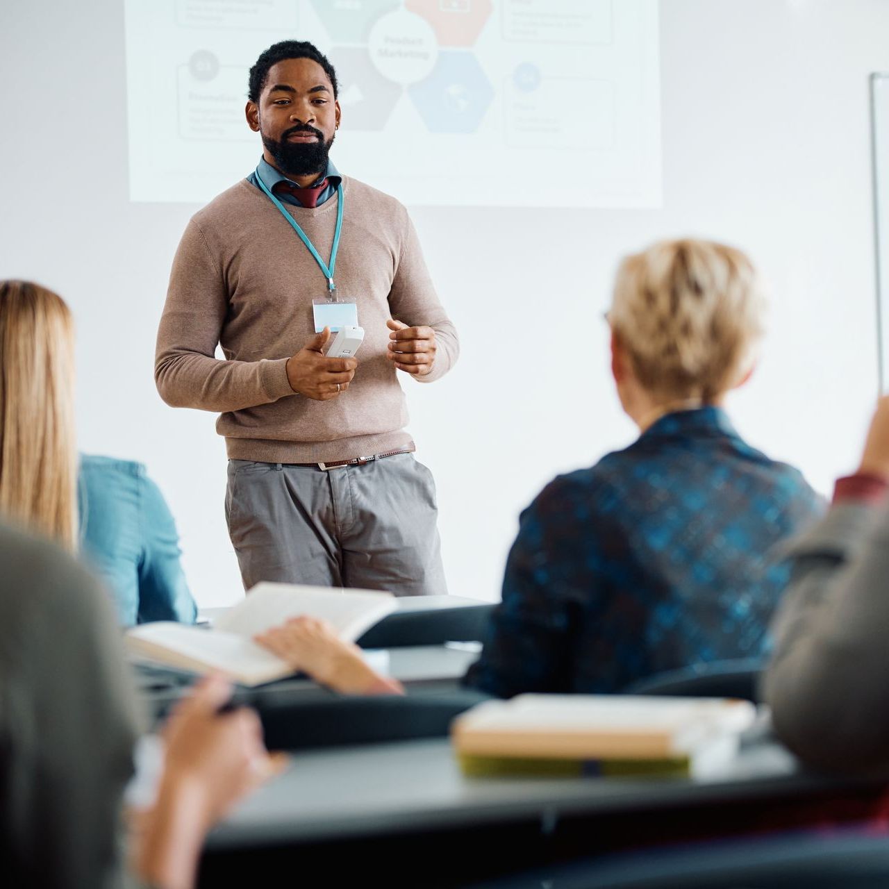 African American professor teaching, his school has need of School & University UPS Background Power